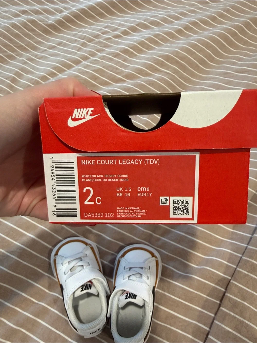 Nike White Kids Sneakers with Brown Accents